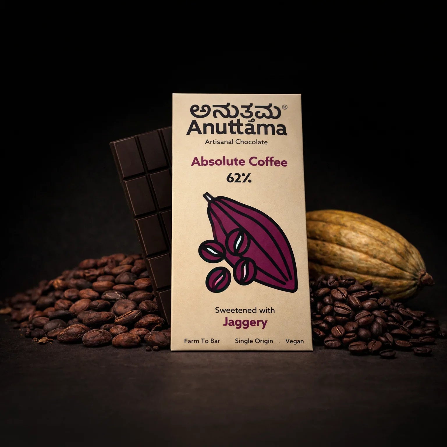 Anuttama 62% Absolute Coffee dark chocolate bar, sweetened with jaggery, surrounded by cocoa beans and coffee beans