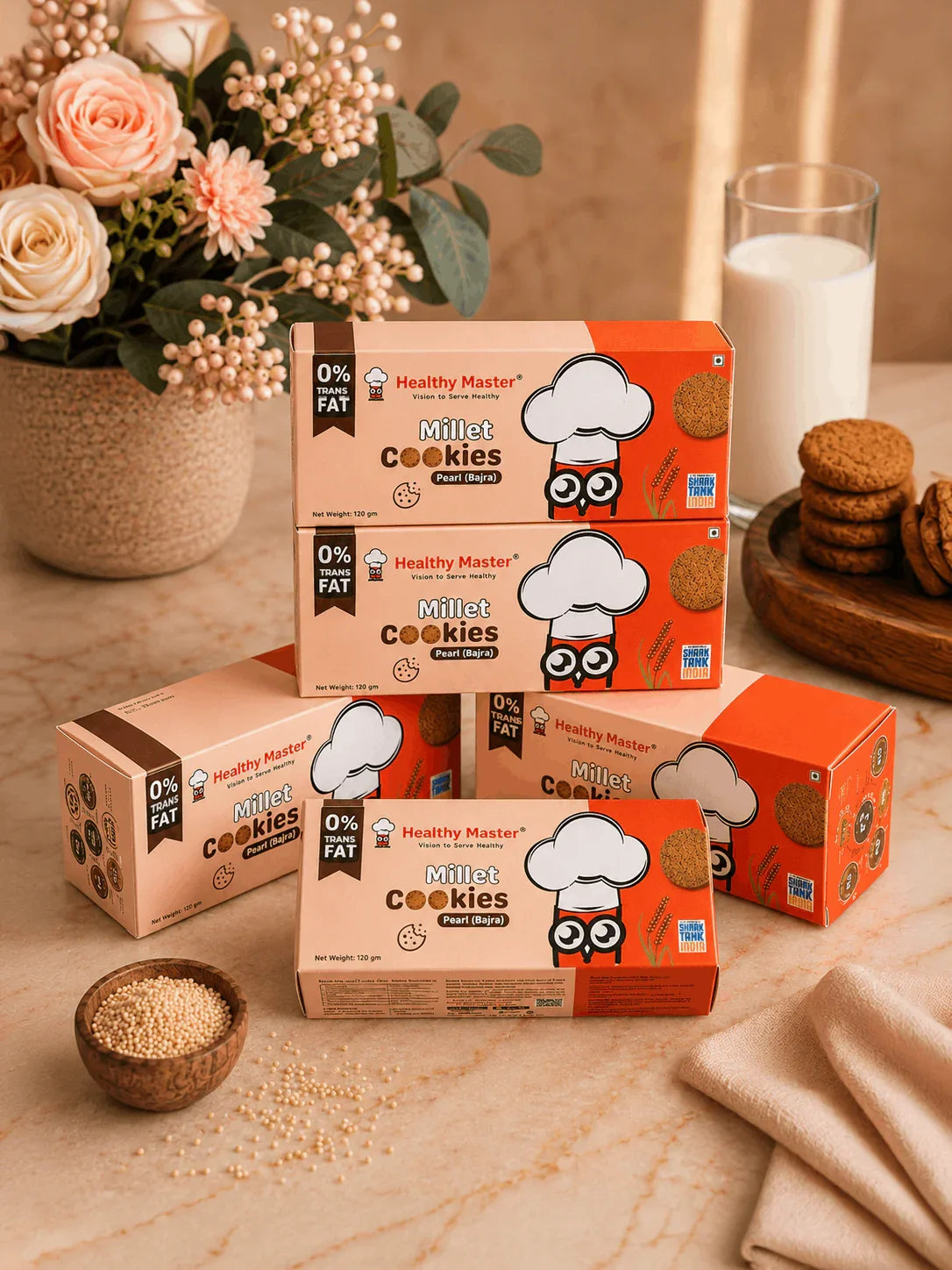 Healthy Master Millet Cookies with pearl bajra, 0% trans fat, served with milk and fresh flowers